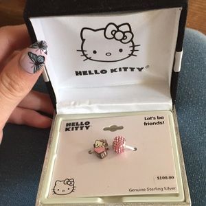 Two hello kitty sterling silver charms